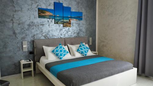 Postel nebo postele na pokoji v ubytování B&B La Munachell