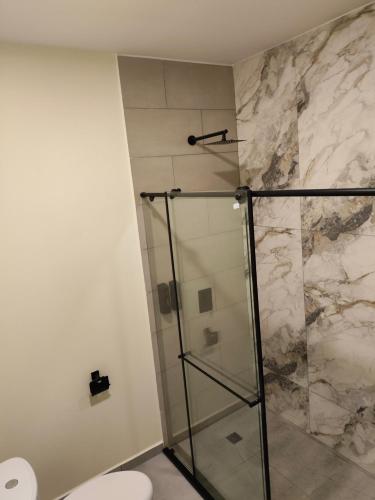 Koupelna v ubytování Hotel HVD Inn Cabecera
