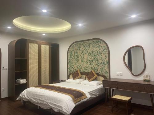 Ένα ή περισσότερα κρεβάτια σε δωμάτιο στο Maison Homestay Pho Bien 17, Ocean Park 3