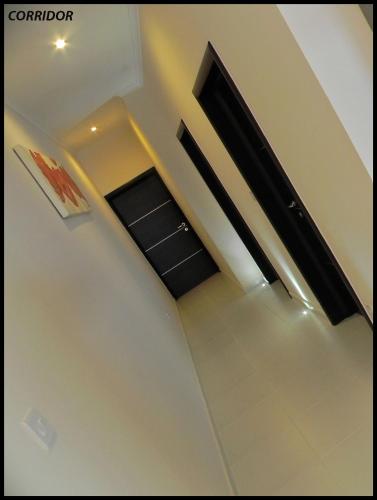a bathroom with a black cabinet in a room at Sea View 2 Bed Apartment close to beach Hpi6768 in Il-Maħsel