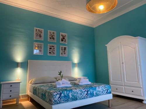 Una cama o camas en una habitación de B&B Morrocoy