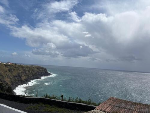 a view of the ocean from a cliff at Casa do Aviador in Relva