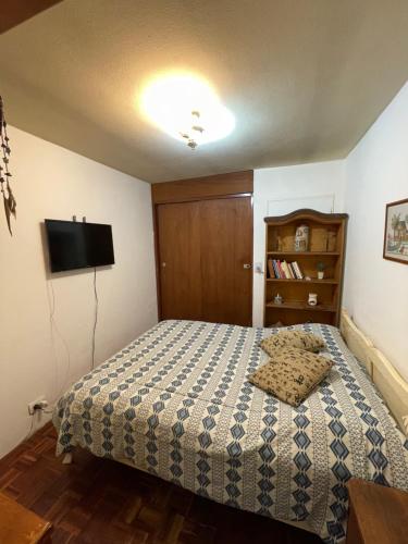 Ένα ή περισσότερα κρεβάτια σε δωμάτιο στο Los abuelos