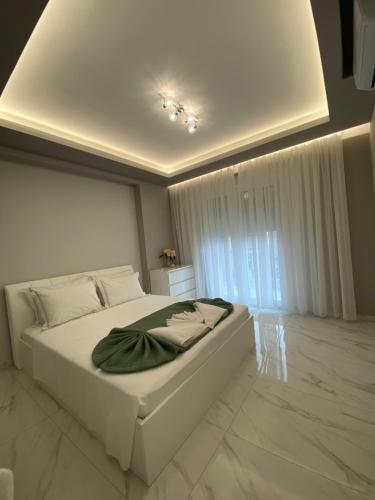Ένα ή περισσότερα κρεβάτια σε δωμάτιο στο Escape Central Apartments