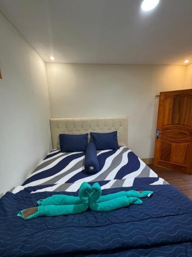 Letto o letti in una camera di Zahra Homestay