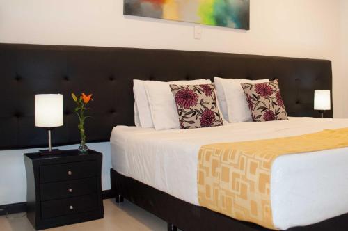 Katil atau katil-katil dalam bilik di Hotel Ferias Park