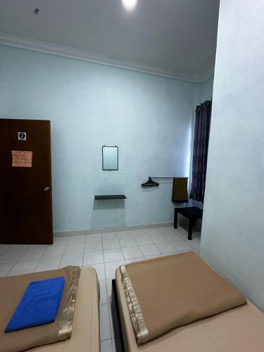Postel nebo postele na pokoji v ubytování MJ - Perhentian