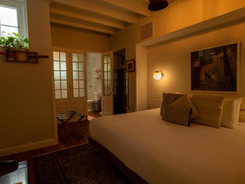 a bedroom with a large bed in a room at Villa Barranco by Ananay Hotels in Lima