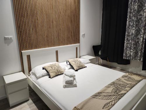 Giường trong phòng chung tại Orange boutique rooms