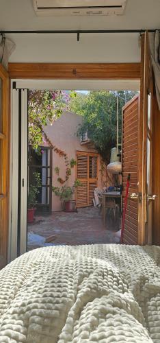 a bedroom with a large bed in a room at La Fuente de Vida in Turre