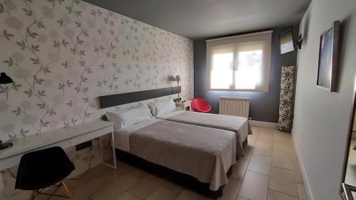 Katil atau katil-katil dalam bilik di Apartahotel Comforsuite