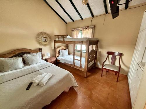 Postel nebo postele na pokoji v ubytování Hotel el laberinto