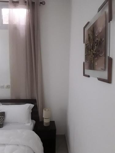 Ένα ή περισσότερα κρεβάτια σε δωμάτιο στο Emmanuella Casa