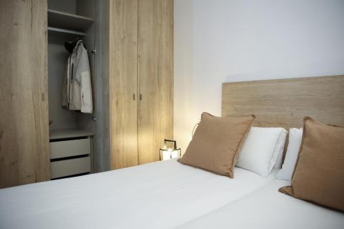 Una cama o camas en una habitación de Apartamentos Telecabine 365