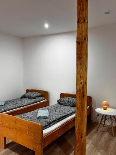 Postel nebo postele na pokoji v ubytování TARNICA