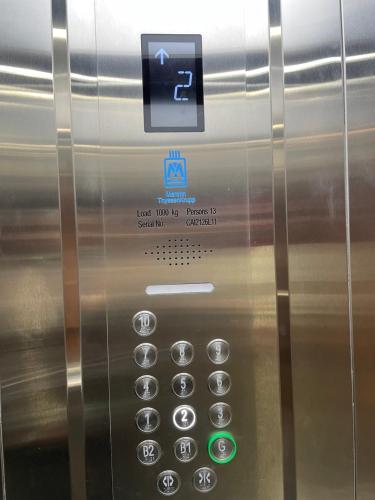 a microwave oven with a control panel on it at Zed Sheikh Zayed modern Apartment in Sheikh Zayed