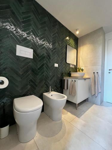 Ένα μπάνιο στο Loft Cream Cremona