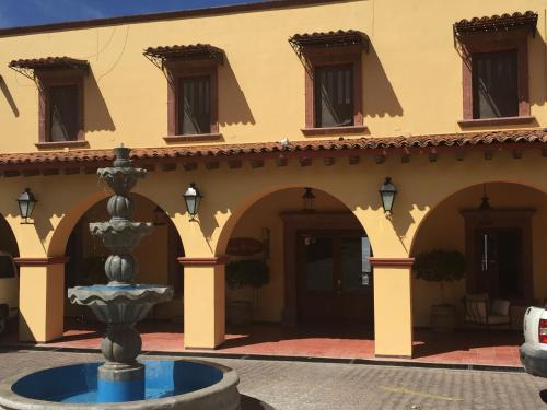 a fountain in front of a building at Mirador del Frayle in San Miguel de Allende