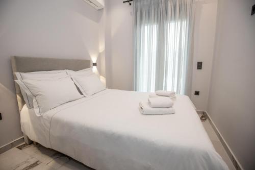 Ένα ή περισσότερα κρεβάτια σε δωμάτιο στο City View Loft