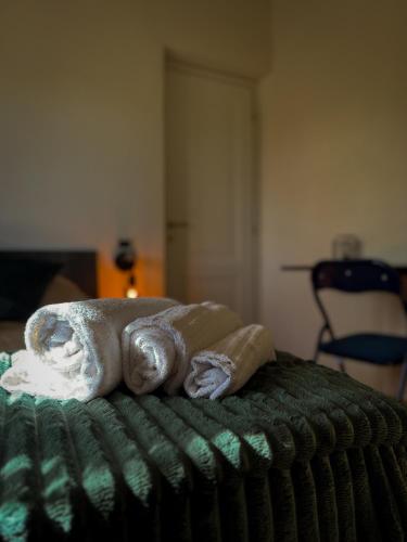a towel sitting on top of a table at White House R&B in Campobello di Licata
