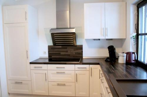 Η κουζίνα ή μικρή κουζίνα στο Ferienhaus Eifelsteig Krimihauptstadt Hillesheim