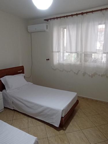 Una cama o camas en una habitación de Ramaj's home