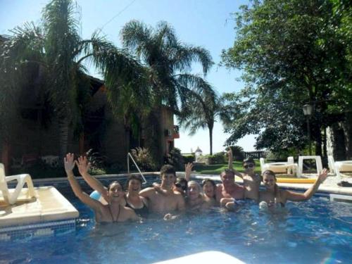 a group of people in a swimming pool at Complejo Costa Marina in Miramar