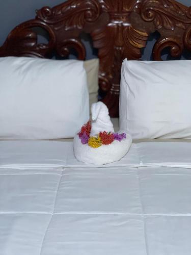 Llit o llits en una habitació de Auglo Villa