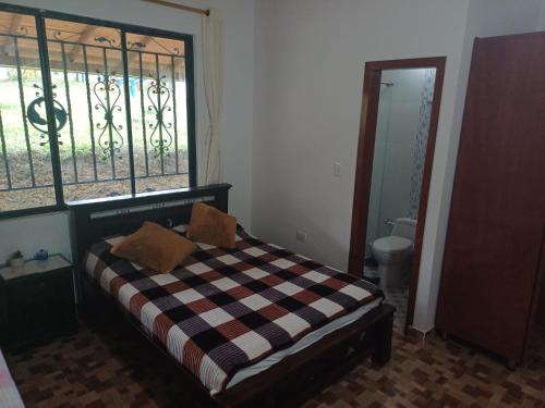 Katil atau katil-katil dalam bilik di Hospedaje Casona Villa Alicia