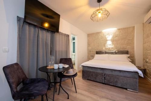 Apartments by the sea Trogir - 24338