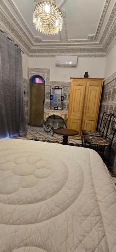 Кровать или кровати в номере Riad Raffaa