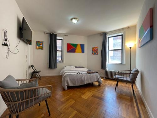 Postel nebo postele na pokoji v ubytování 2-Bedroom Apartment in the Bronx and Pet Friendly