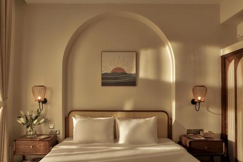 Ένα ή περισσότερα κρεβάτια σε δωμάτιο στο RUBENS BOUTIQUE HOTEL