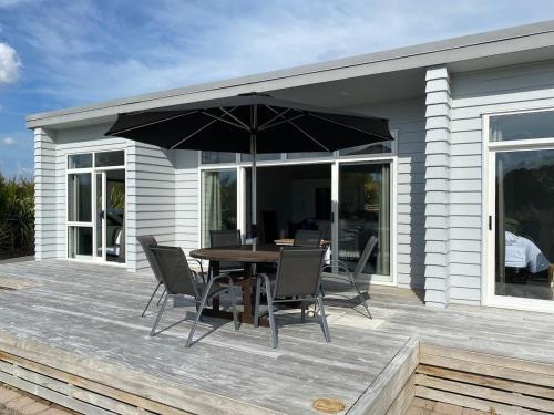 Φωτογραφία από το άλμπουμ του Modern & Comfy 2-Bedroom House σε Newstead