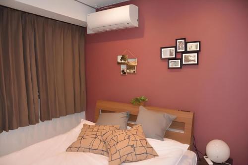 Postel nebo postele na pokoji v ubytování AN HOTEL