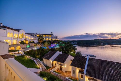 an aerial view of a hotel and the water at Miyako Resort Shima Bayside Terrace in Shima