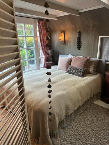 Postel nebo postele na pokoji v ubytování De Schuilhoek Private Guesthouse