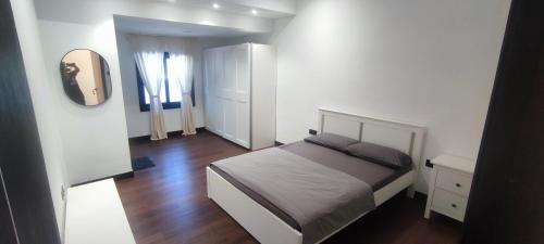 Ένα ή περισσότερα κρεβάτια σε δωμάτιο στο Akasea Sojourn