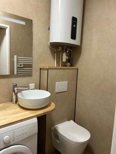 Photo de la galerie de l'établissement Studio cosy avec jardin et parking, à Fontaine-le-Comte