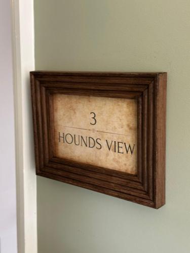 a wooden picture frame on a wall with the wordslords view at Black Horse in Brent Pelham