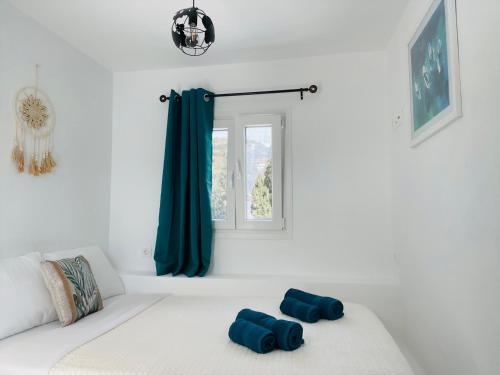 Ένα ή περισσότερα κρεβάτια σε δωμάτιο στο Beach House Batsi