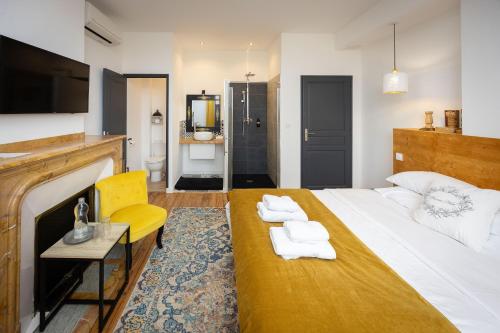 Posteľ alebo postele v izbe v ubytovaní SalutBB Chambre d'hote
