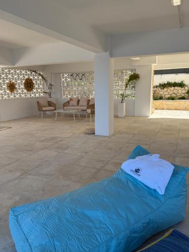 Letto o letti in una camera di Fronte Mare Suite - Sea Front Luxury Suite With Private Beach Patio