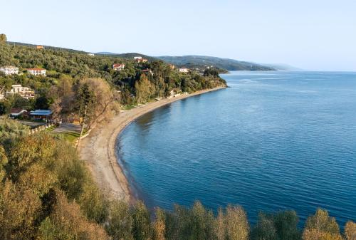 an island in the middle of a body of water at Vista Mare in Afissos