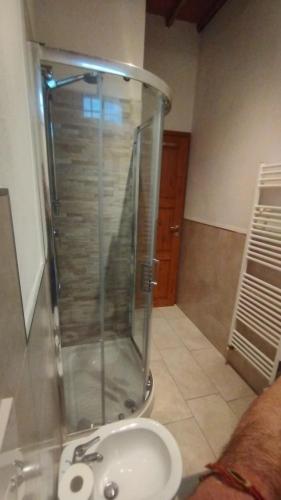 a bathroom with a shower and a sink at Dimora toscana in Santa Maria del Giudice