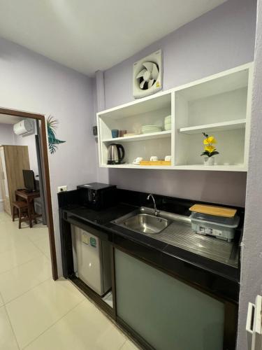 Kuchyň nebo kuchyňský kout v ubytování Pupa Rooms