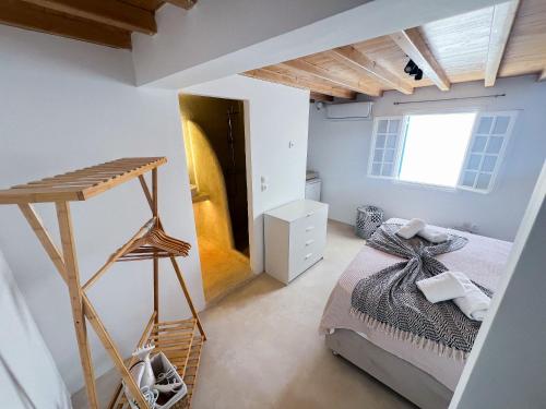 Ένα ή περισσότερα κρεβάτια σε δωμάτιο στο Kamara Residence & Suites