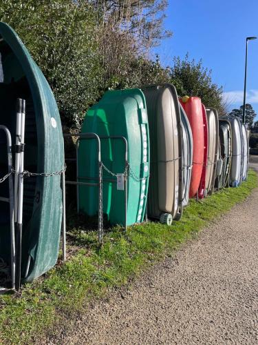 a row of portable toilets sitting next to a road at La Parenthèse du golfe chambre d hôte in Arradon