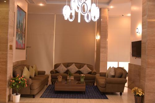Χώρος καθιστικού στο Dahlia Hotel Apartment Riggae
