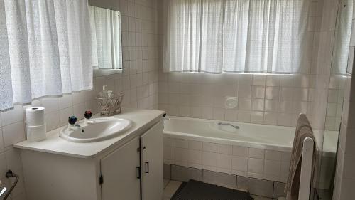 Ένα μπάνιο στο Mooiplaas Guest Farm